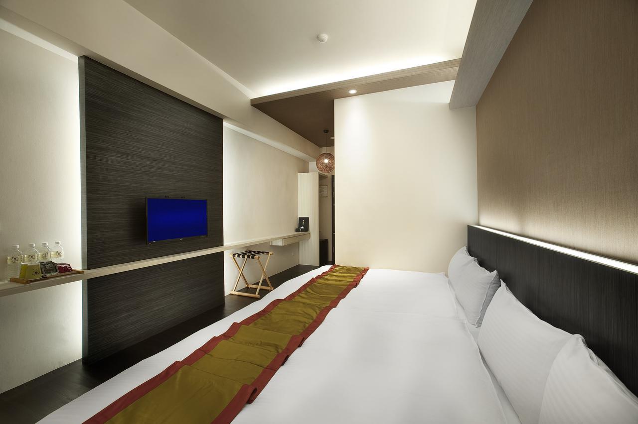 One Fukun Hotel Цзяоси Экстерьер фото