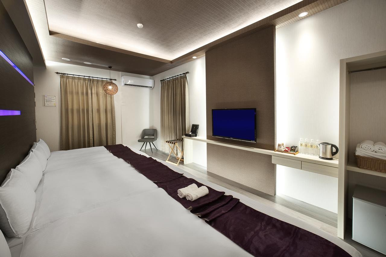 One Fukun Hotel Цзяоси Экстерьер фото