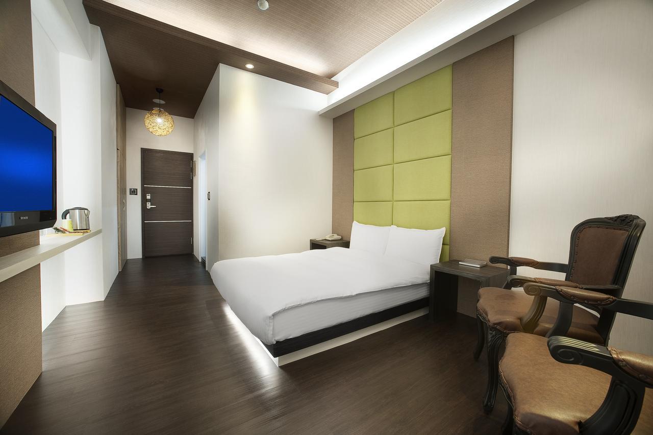 One Fukun Hotel Цзяоси Экстерьер фото